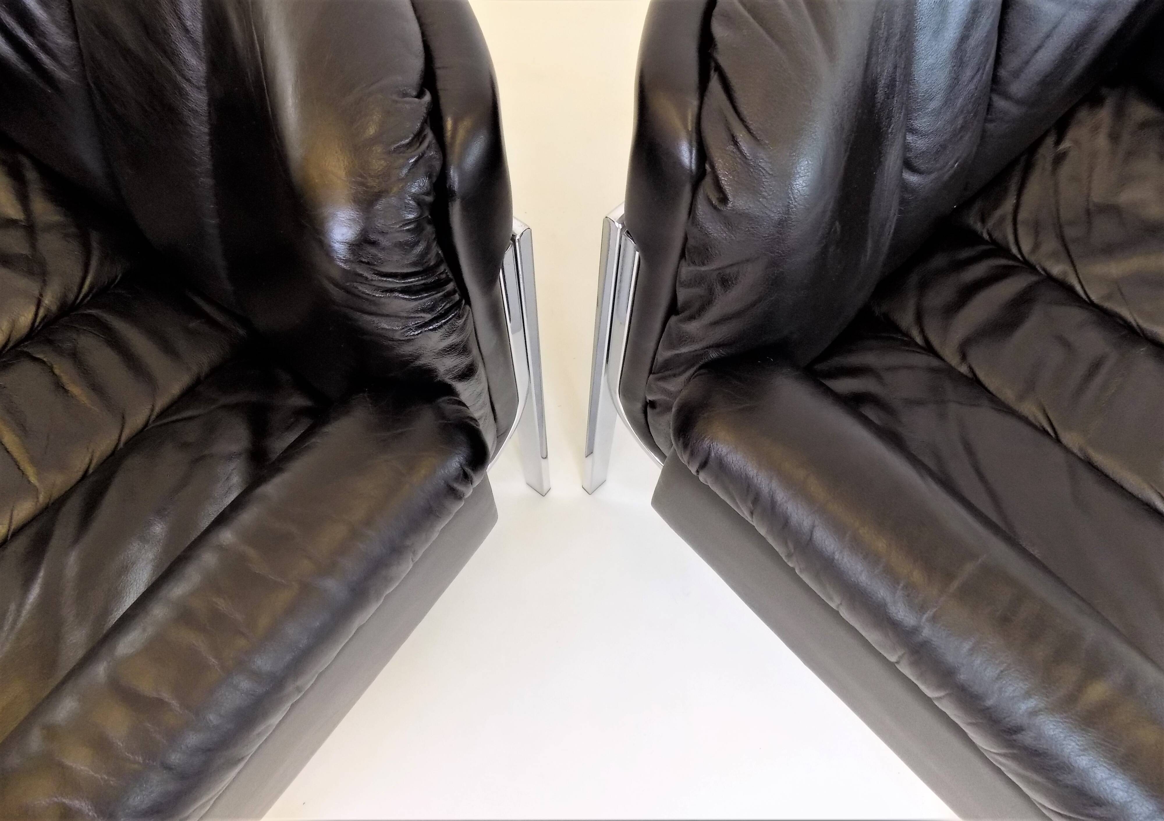 Set of 2 Girsberger Eurochair leather armchairs
