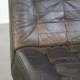 Gray leather design element/ armchair from the 70s + footstool