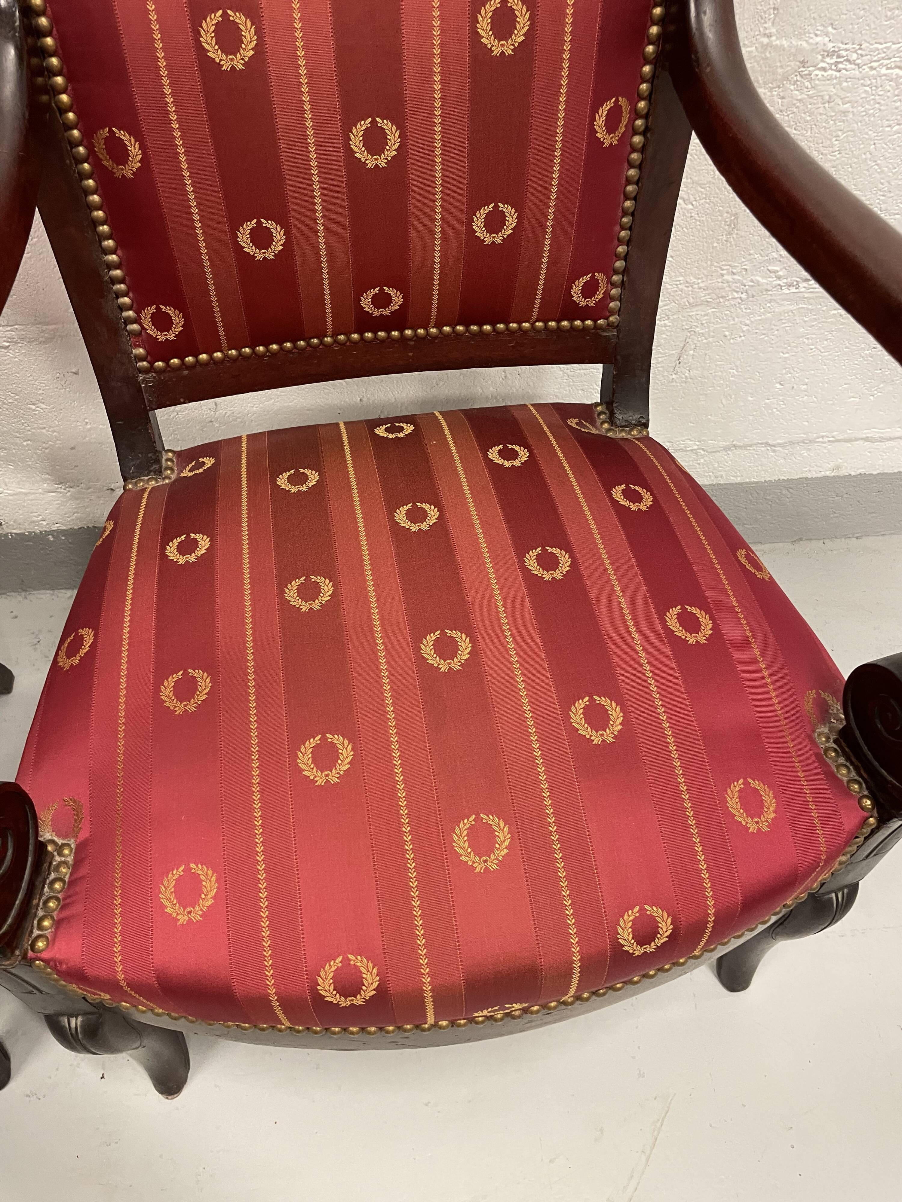Pair of empire period armchairs in mahogany and silk