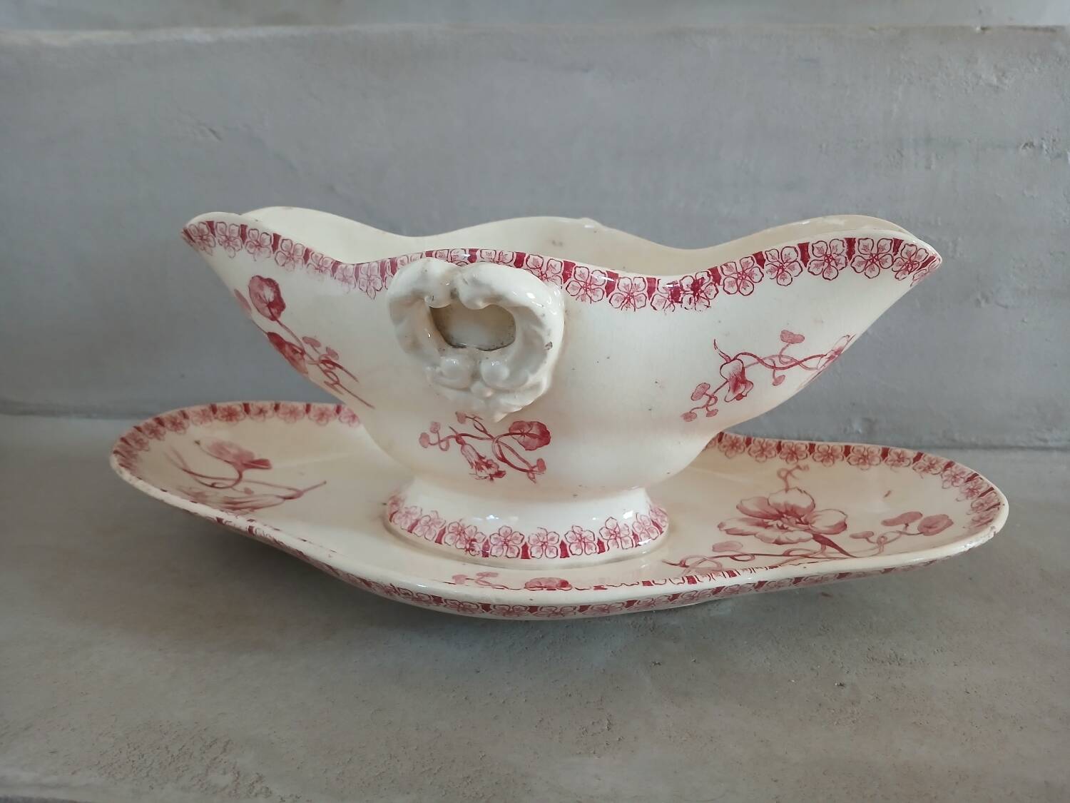 Antique sauce boat in Gien ironstone.