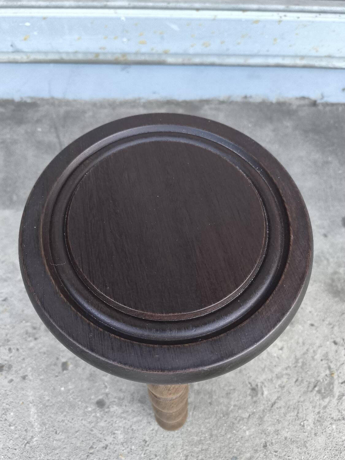 Turned wooden tripod stool