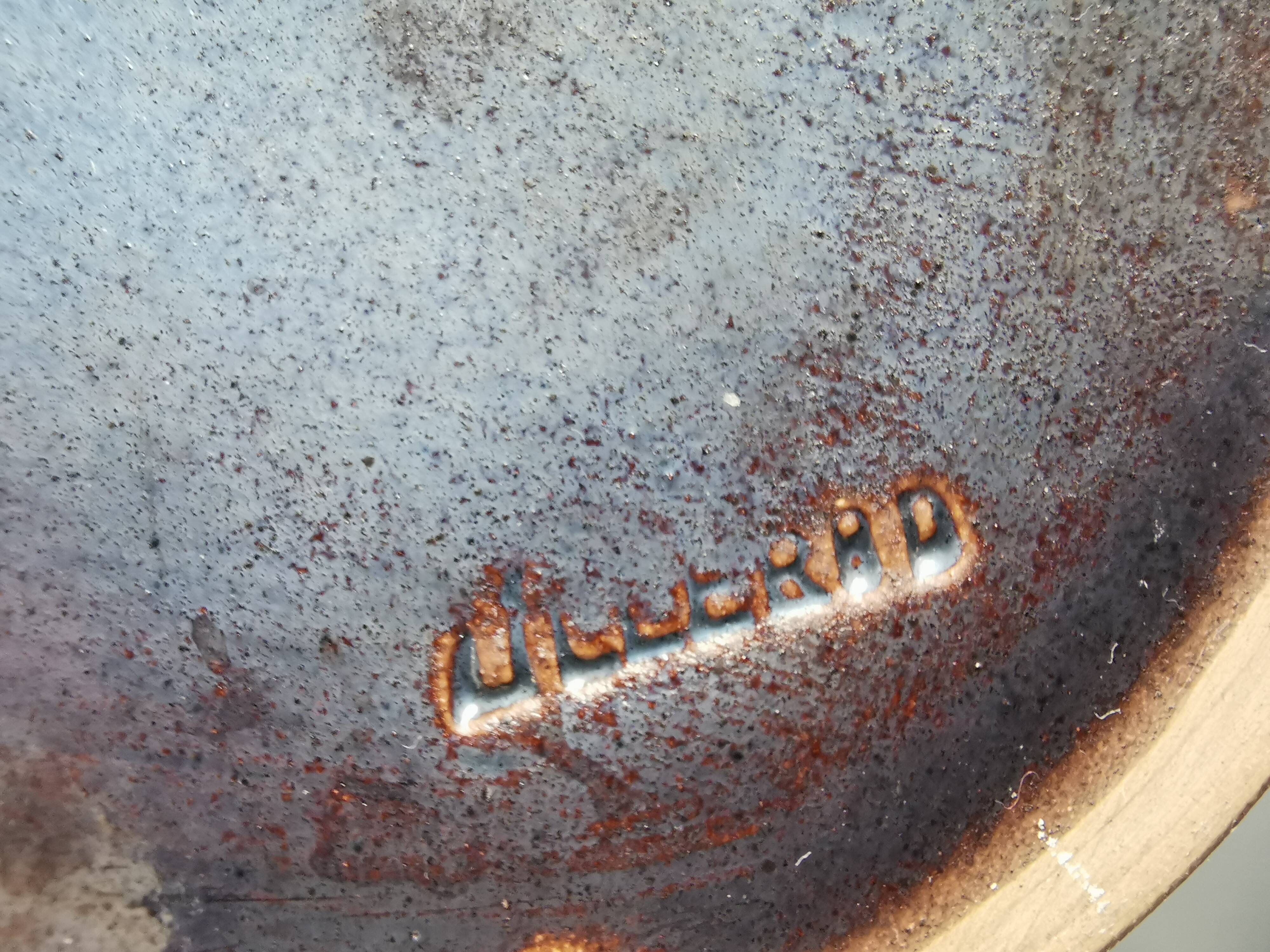 A set of ceramic candlesticks in bluish metallic glaze, Denmark 1980s