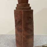 Large chamotte clay lamp in brutalist style, with a plant motif.