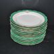 Paris porcelain set of 12 flat plates with green border and gold monogram JC.