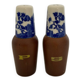 Salt and pepper shaker with blue decoration.