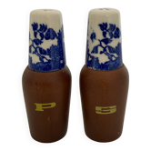 Salt and pepper shaker with blue decoration.