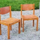 Pair of brutalist chairs in elm and stretched leather with saddle stitching Self publisher