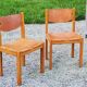 Pair of brutalist chairs in elm and stretched leather with saddle stitching Self publisher