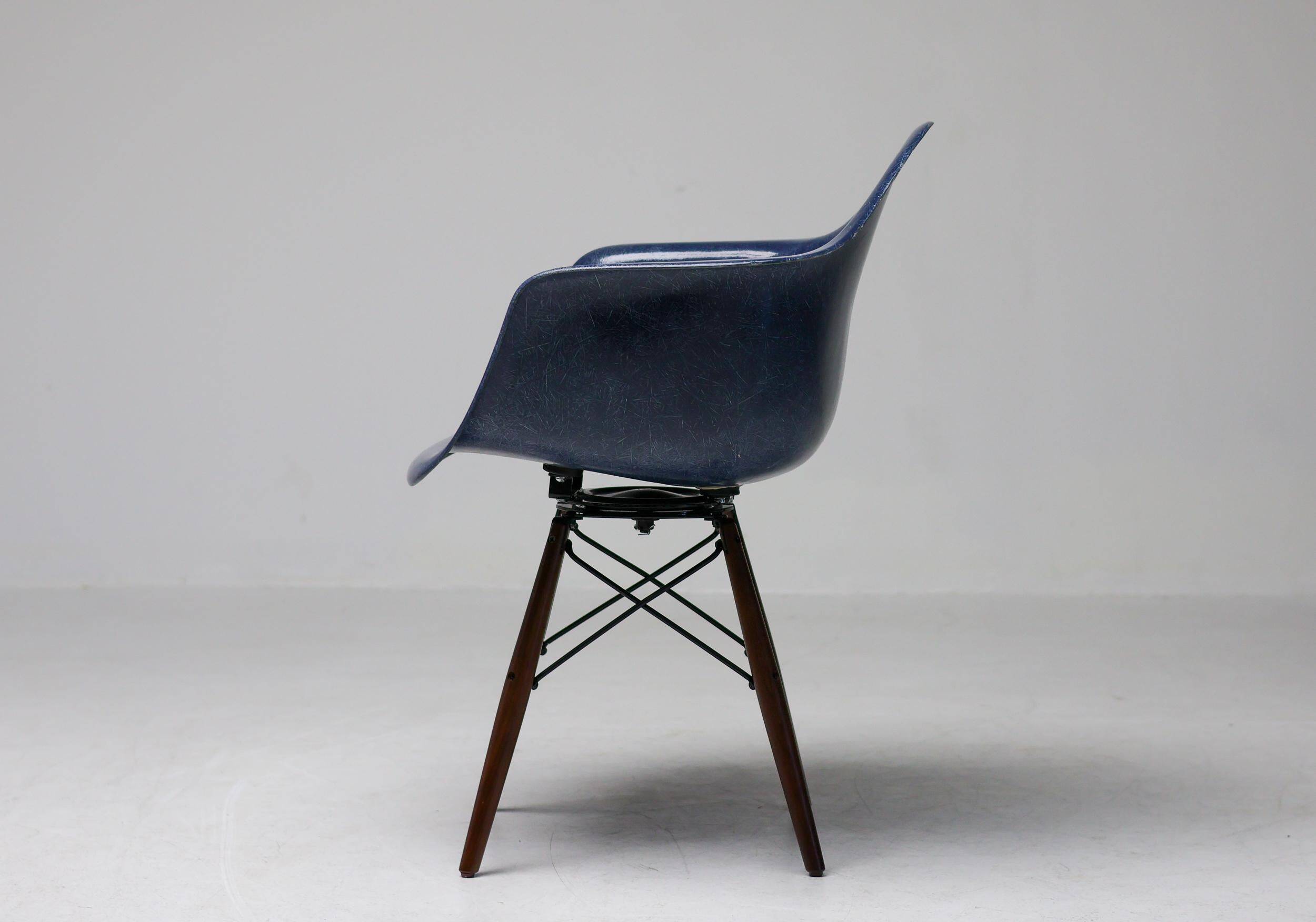 Indigo blue Charles Eames "PAW" armchair by Herman Miller, mid-century modern.