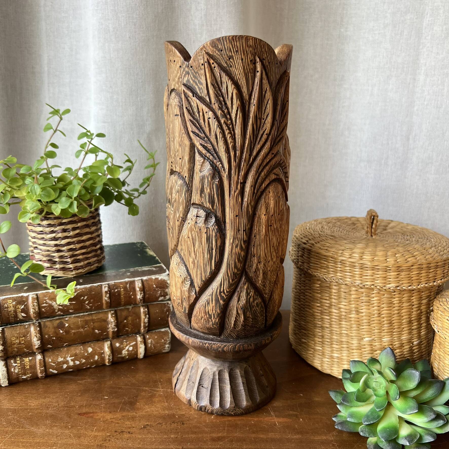 Large sculpted vase made of solid wood