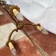 Tripod floor lamp in brass circa 1960s-1970s Dimension: height -168cm- width -38cm-