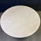 Round French travertine dining table 1970s