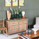 rattan chest of drawers with green details