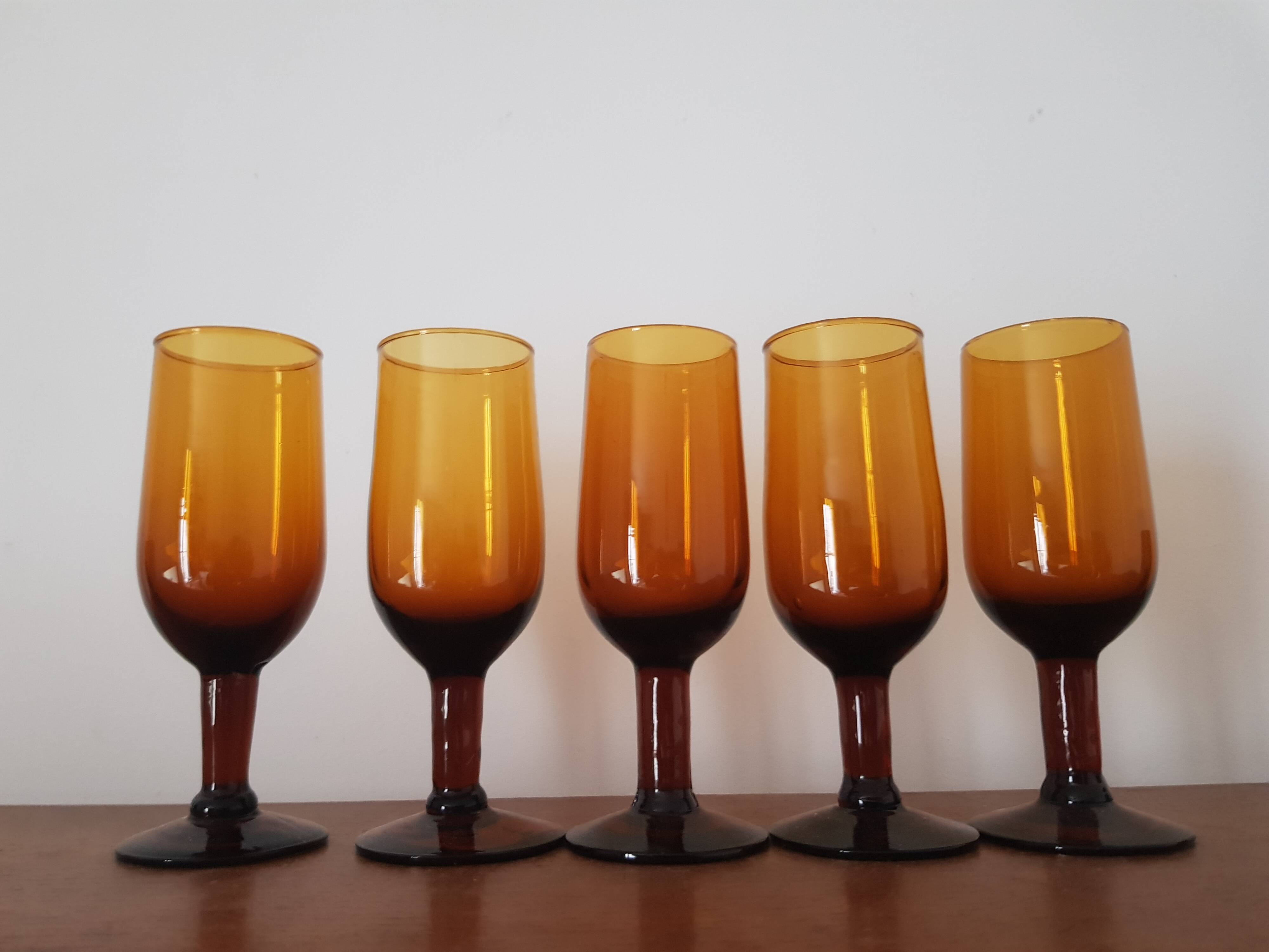 Set of 5 amber stemmed glasses