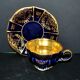 A precious, multi-lobed cup in German cobalt porcelain with a gold interior, Lindner Bavaria.