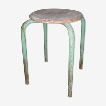 Old school stool made of metal and wood