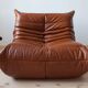 Ensemble Togo de canapé 2 places, fauteuil et pouf en cuir marron whiskey.