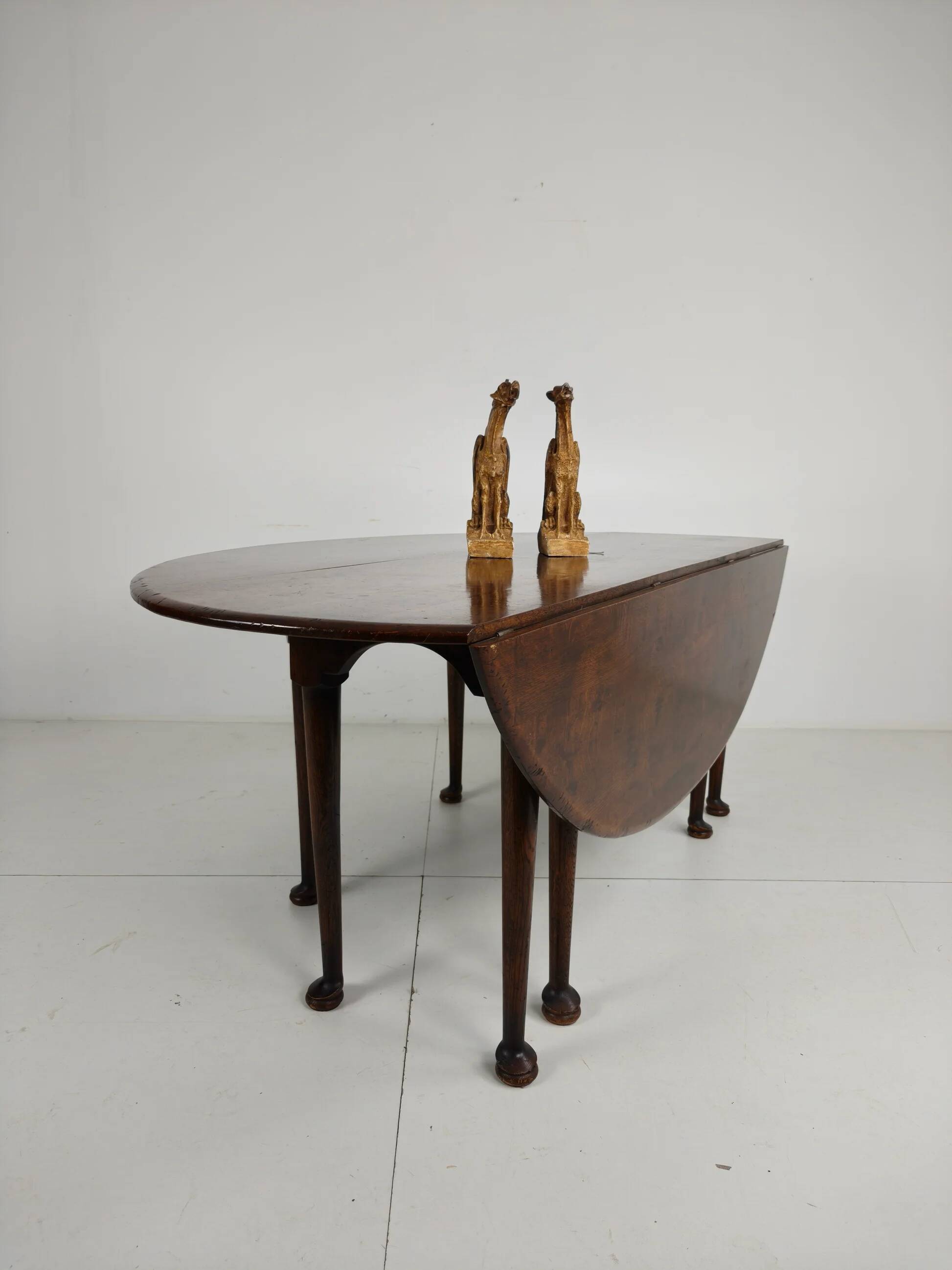 Antique English drop-leaf dining table – Victorian – 8 legs – oval shape – seats 8