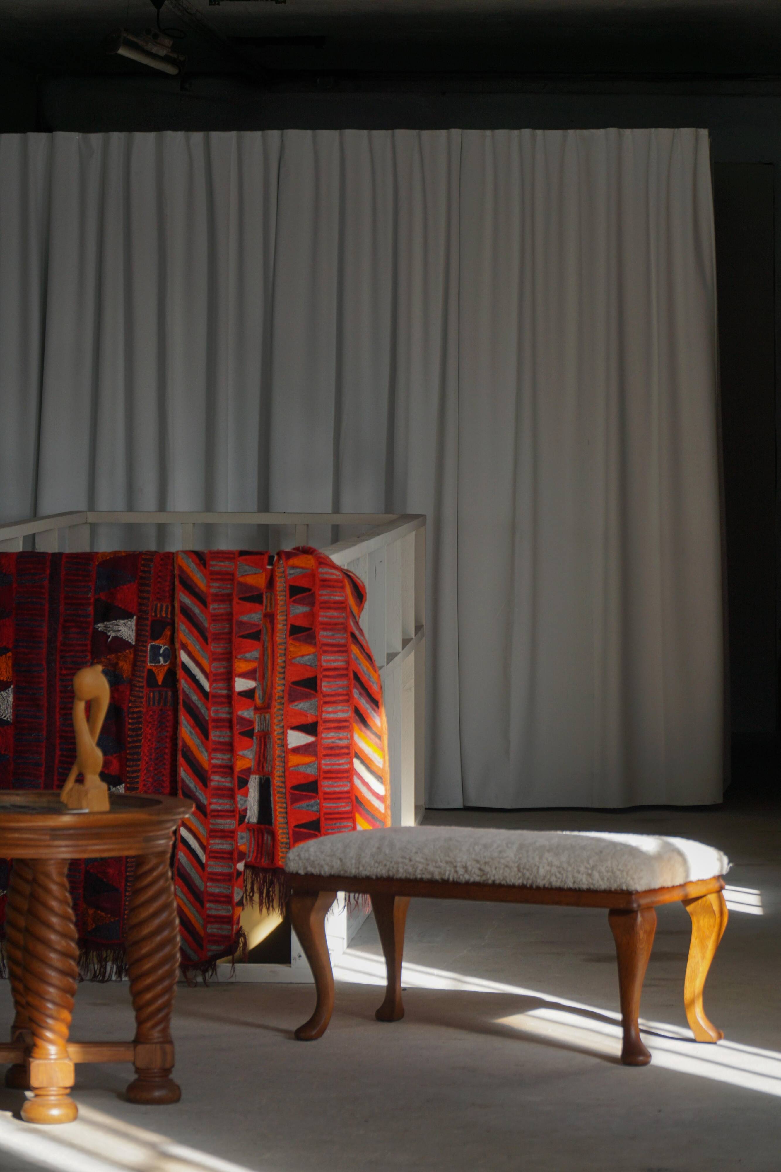 Danish rococo-style bench, cabriole legs and lambswool seat, early 20th century.