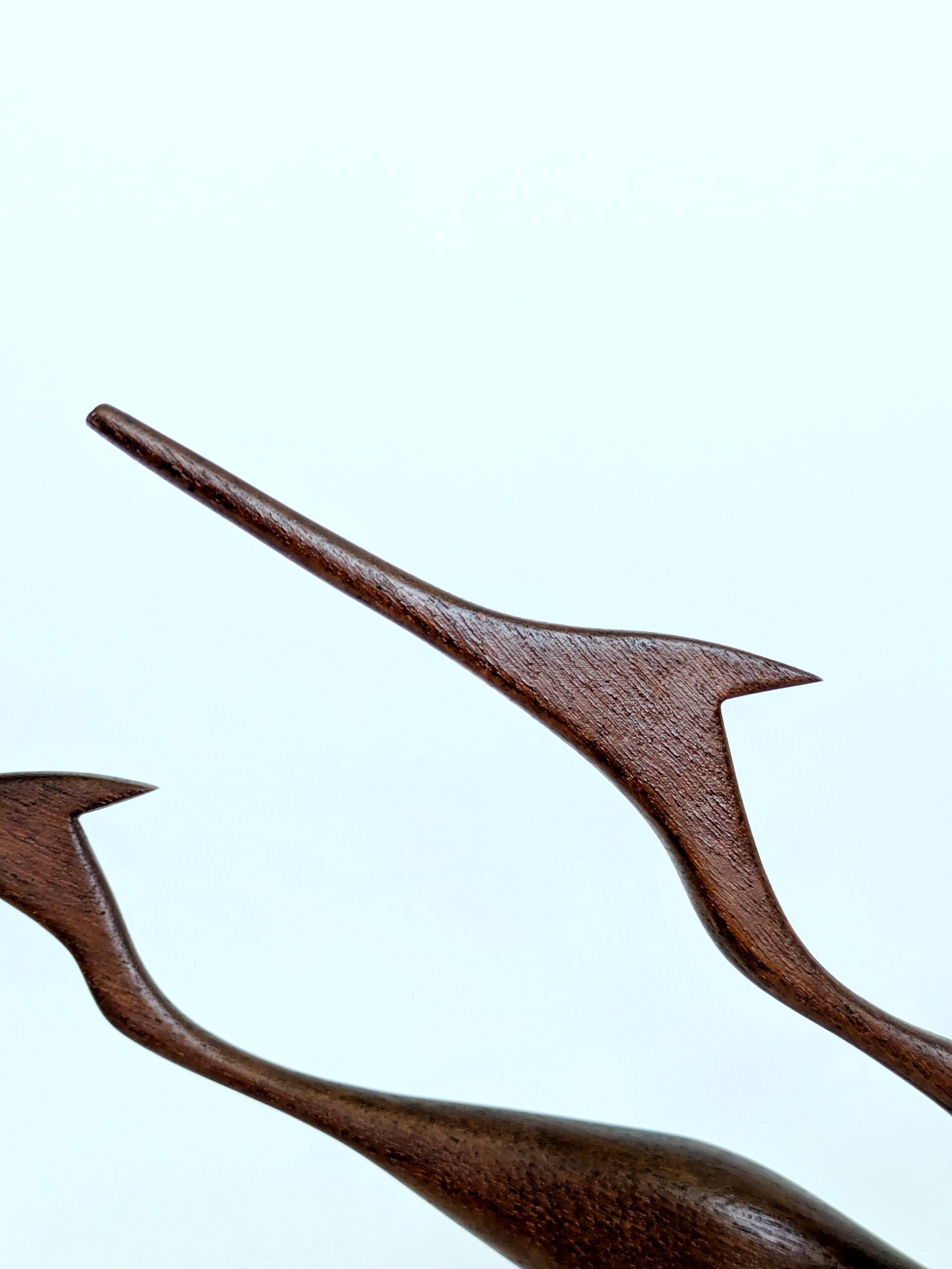 Scandinavian modernist sculpture cranes in teak.