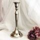Chromed metal candle holder