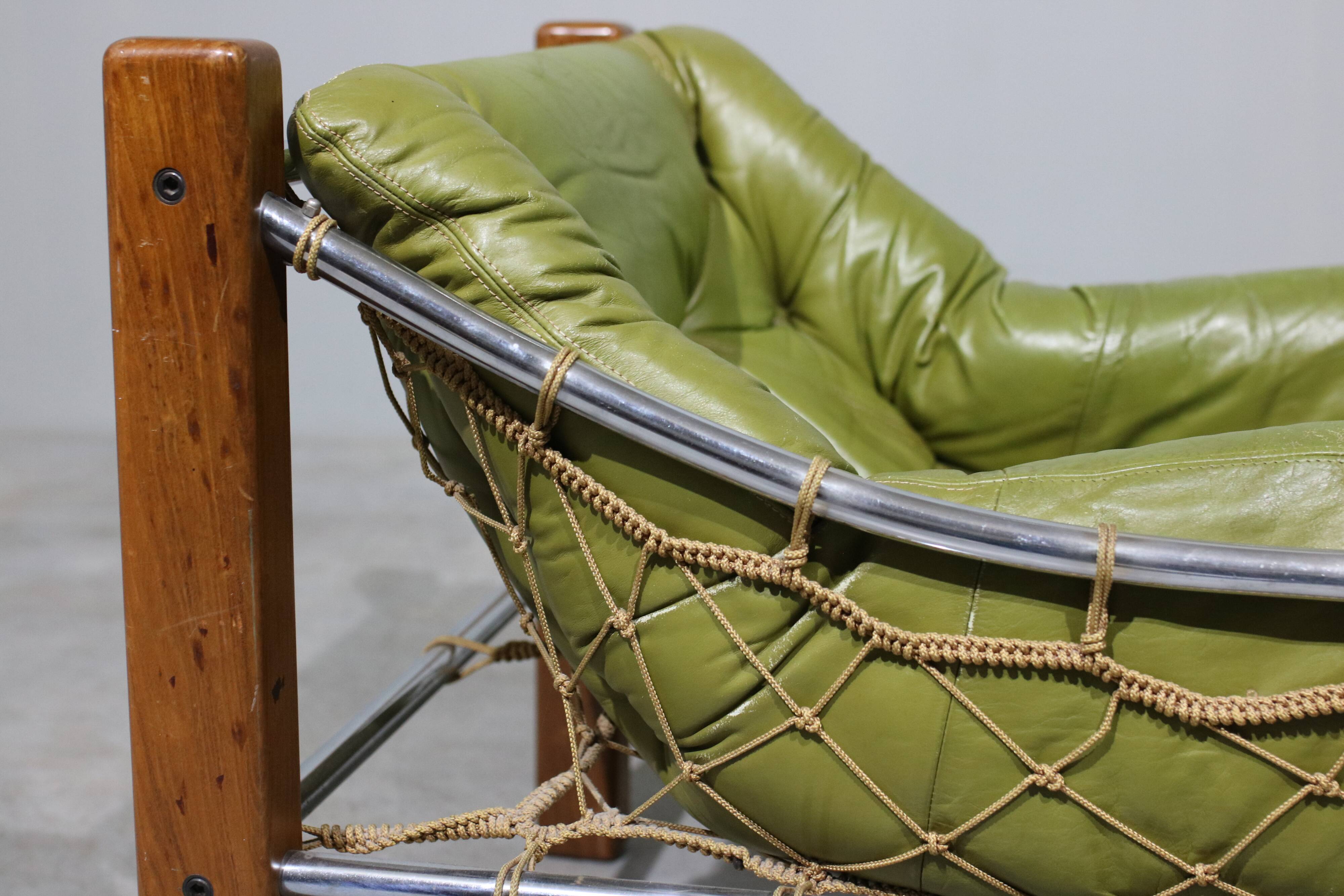 Leather Armchair and Ottoman by Jean Gillon