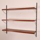 Scandinavian teak and brass metal shelf