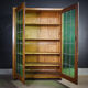 Bibliothèque antique avec portes en verre souillé Brun / Vert - années 1920