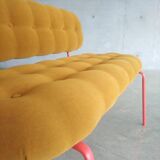 Upholstered bench with tufting