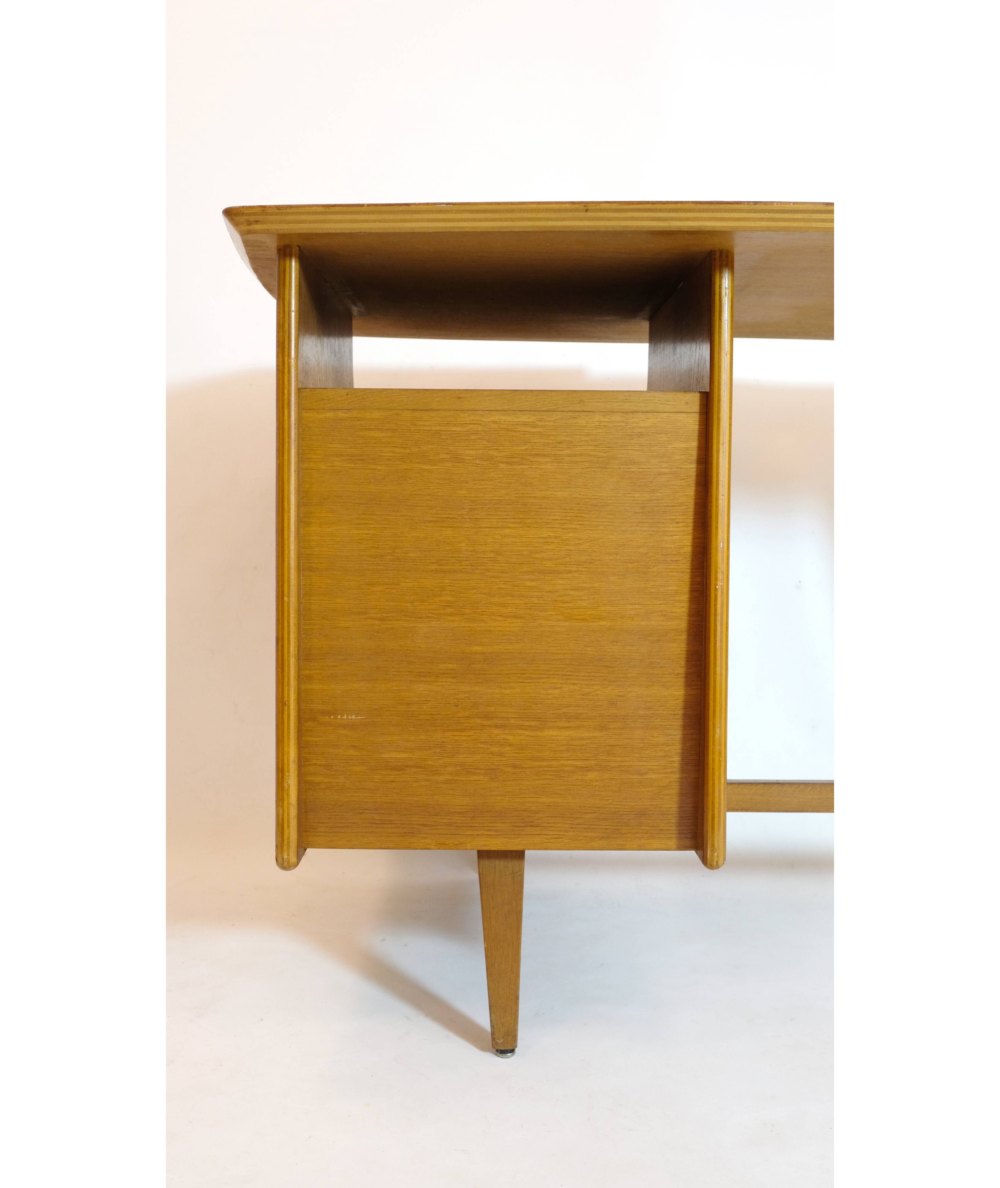 Jacques Hauville, tripod oak desk, 1950