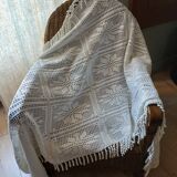 Old crocheted bedside table/plaid