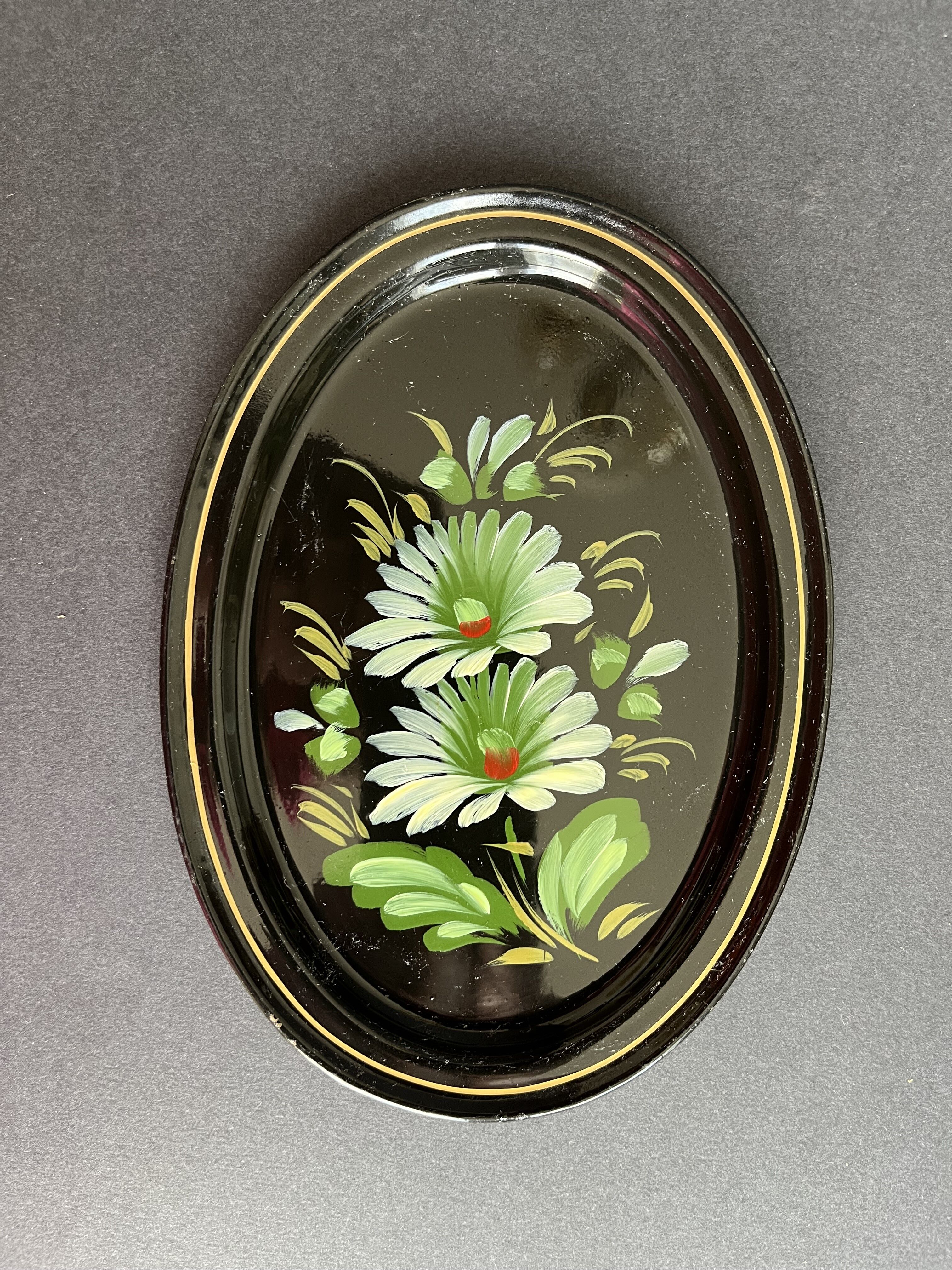Set of three painted sheet metal trays