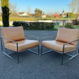 Paire de fauteuils chauffeuses contemporains cuir