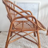 Pair of vintage rattan armchairs circa the 1970s.