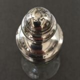 Glass sugar sprinkler and silver metal