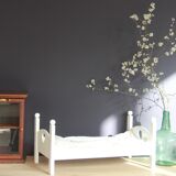 Painted wooden doll bed