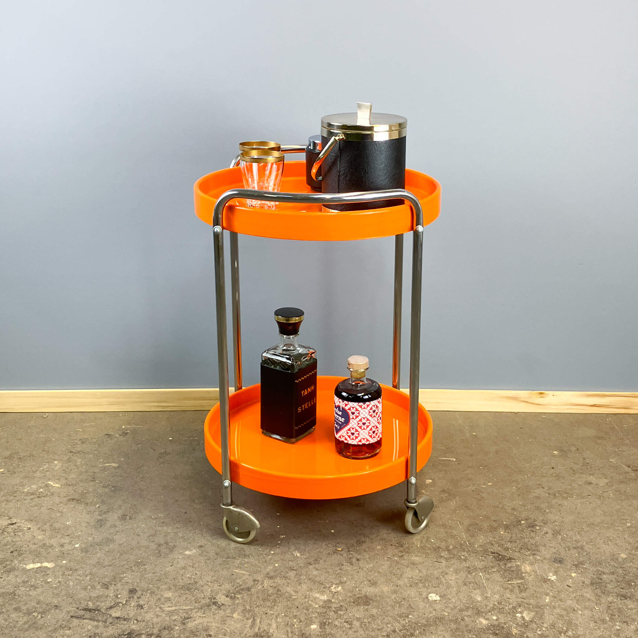 Space Age serving trolley, chrome and orange plastic trays, 1970s