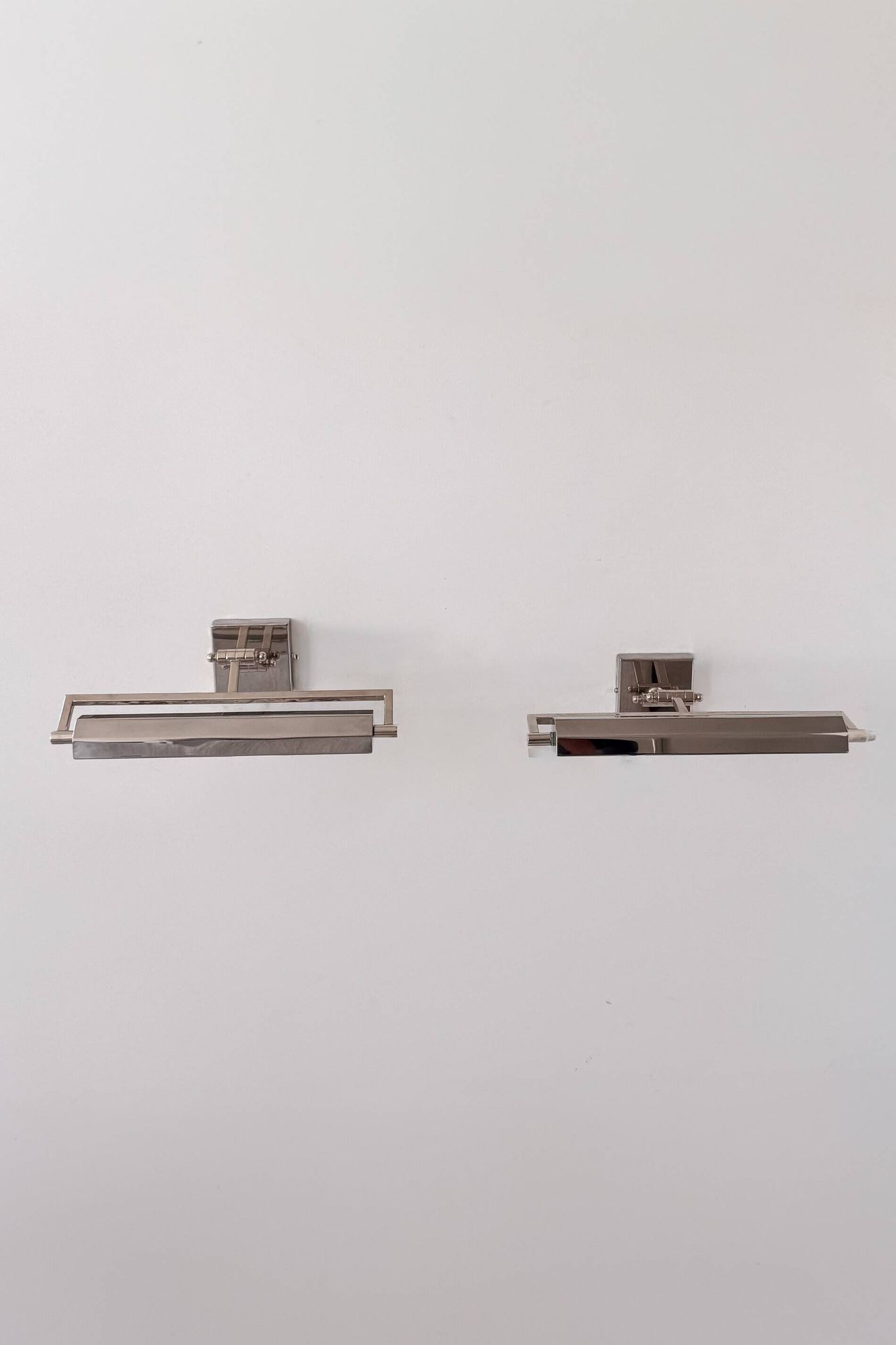 Pair of adjustable vintage wall lights in chrome, France, 1970.