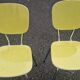pair of yellow Formica chairs