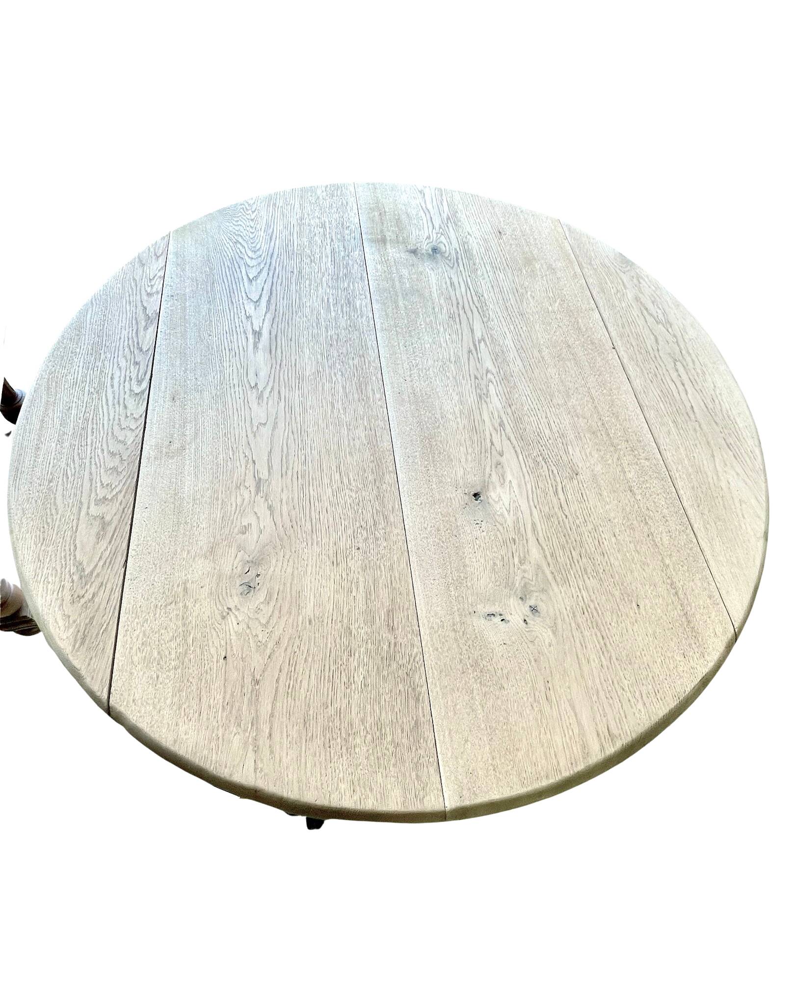 restored raw oak round table from yesteryear