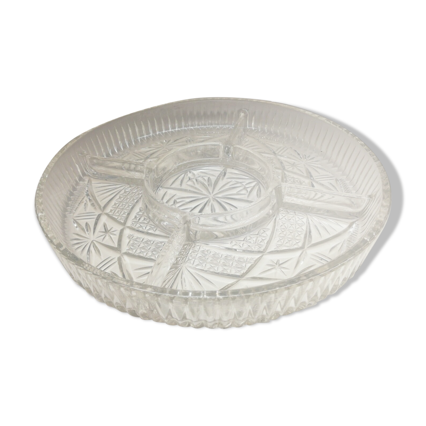 Pan-fried aperitif dish in chiseled glass