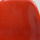 Chaise Eames produite par Herman Miller rouge