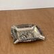 Antique silver-plated ashtray, decorated with repoussé scenes of a tavern, pin tray.