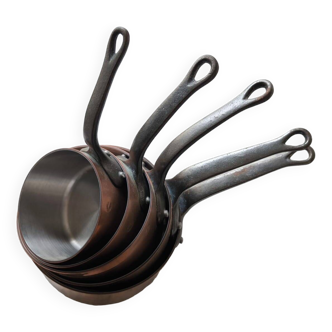 Series of 5 copper and stainless steel saucepans