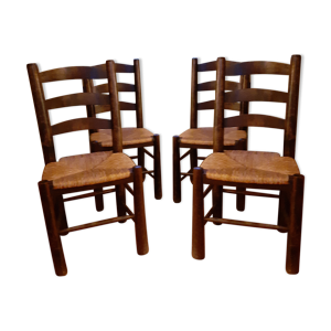 4 chaises vintage en bois massif.  style brutaliste. siège en paille.  très solides et très bon état