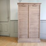 Antique furniture with double curtains sanded to white