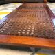 Table basse en merisier plateau verre cannage