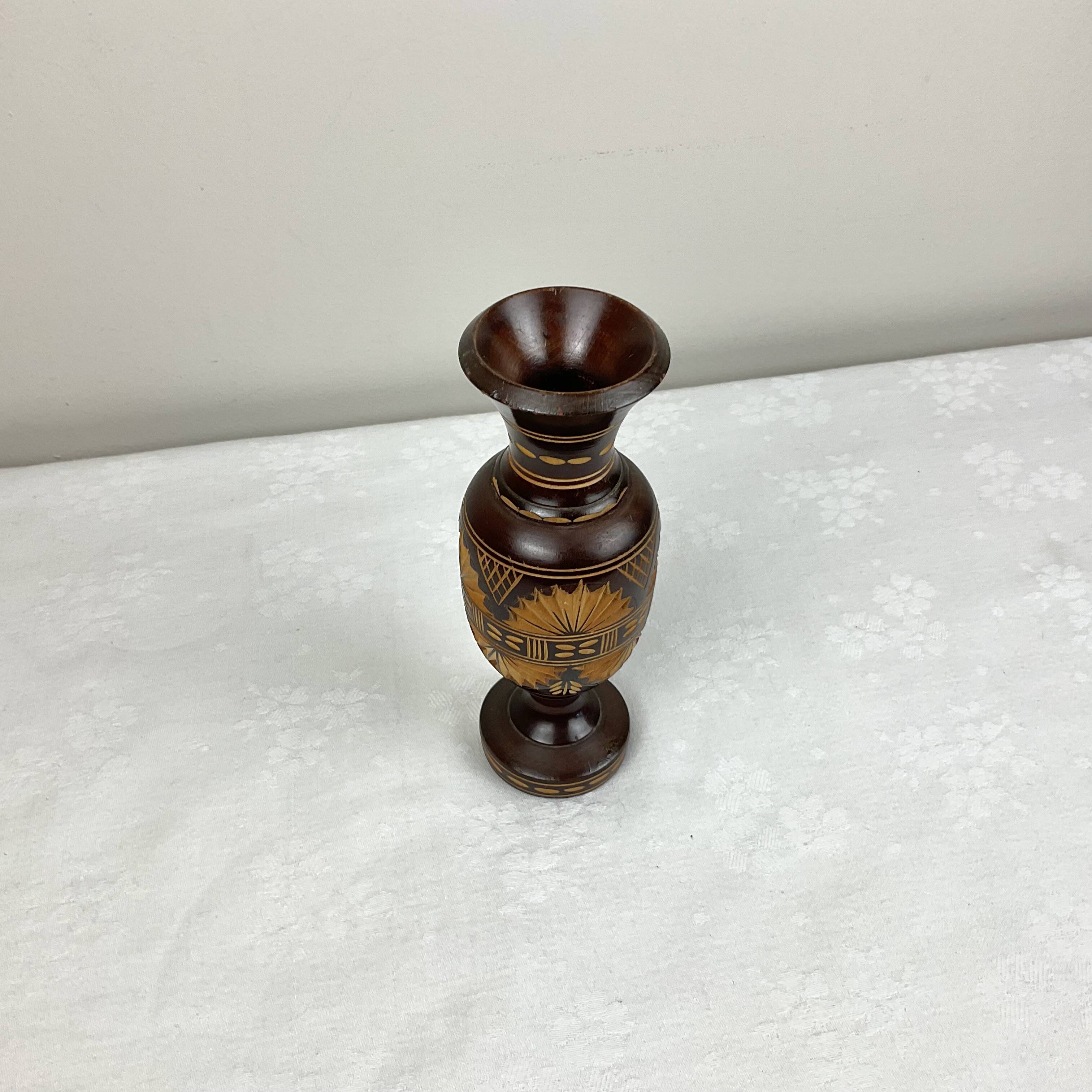 Carved wooden vase