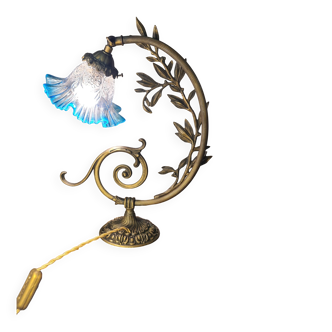 Bronze and brass lamp, transparent and blue glass shade.