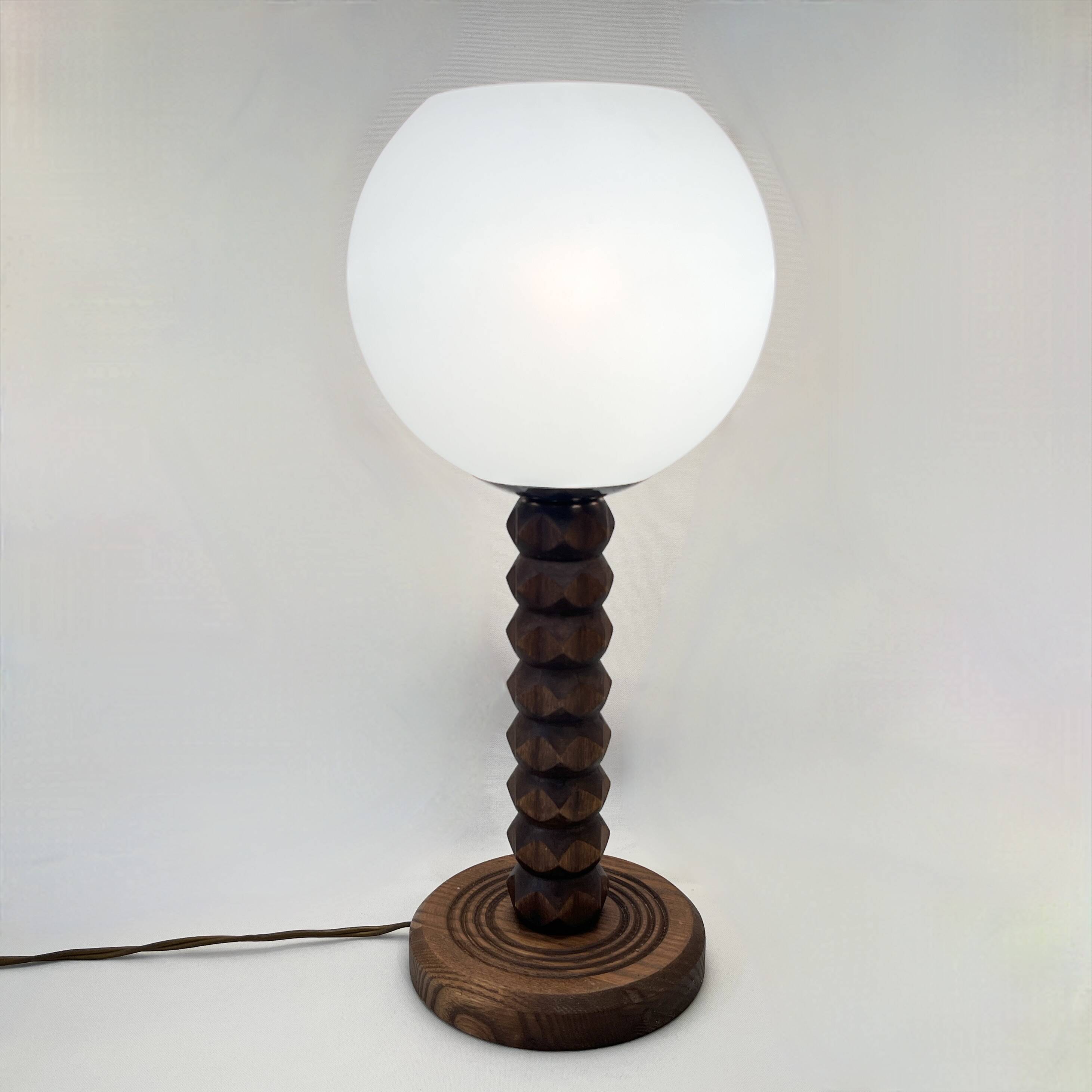 Wooden lamp in wabi-sabi brutalist style by Charles Dudouyt with white opaline.